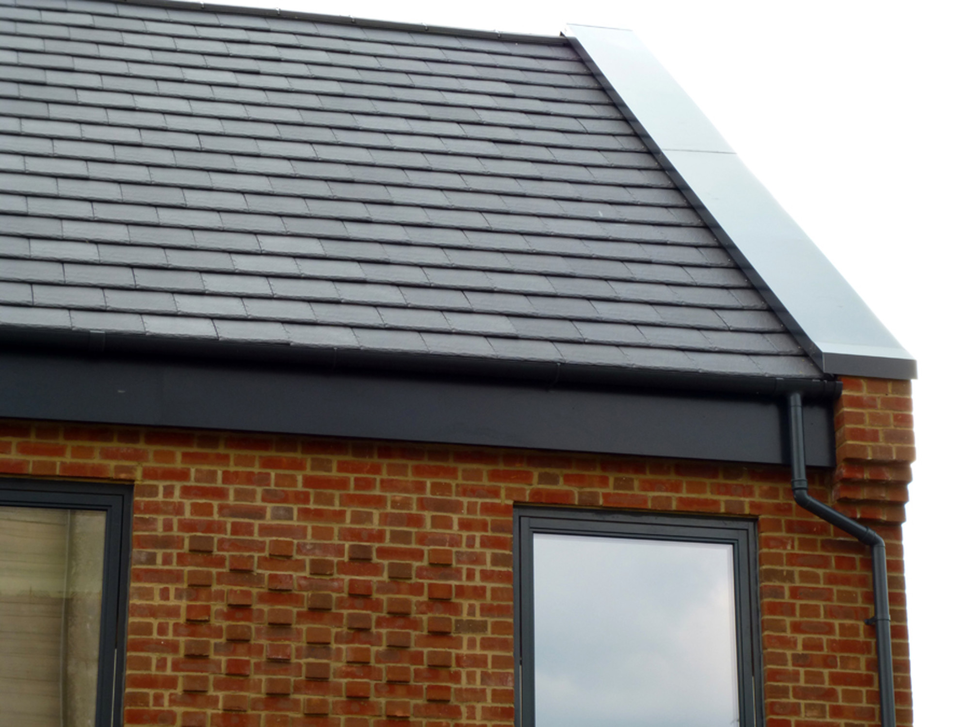 Aluminium guttering by Marley Alutec e4 brick house